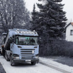 Transporte Grixa - 3-Achs-Seitenkipper mit Bagger